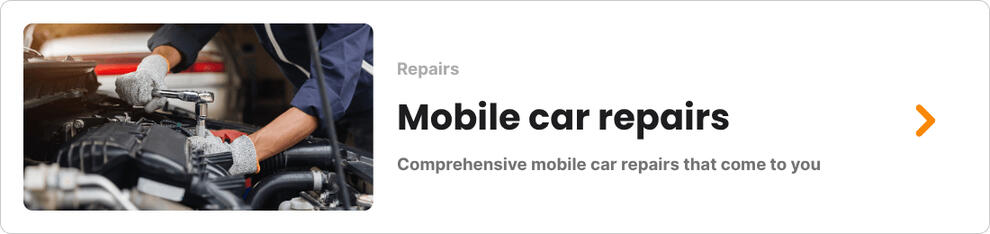 Close-up of a car dashboard showing high mileage, often used by dishonest mechanics to scare customers into repairs.