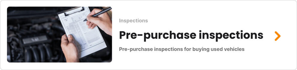 Close-up of a car dashboard showing high mileage, often used by dishonest mechanics to scare customers into repairs.